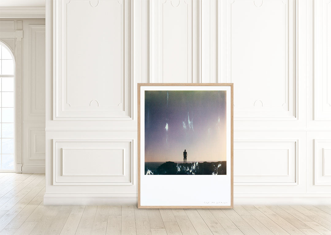Décoration tirage Polaroid grand format homme mer