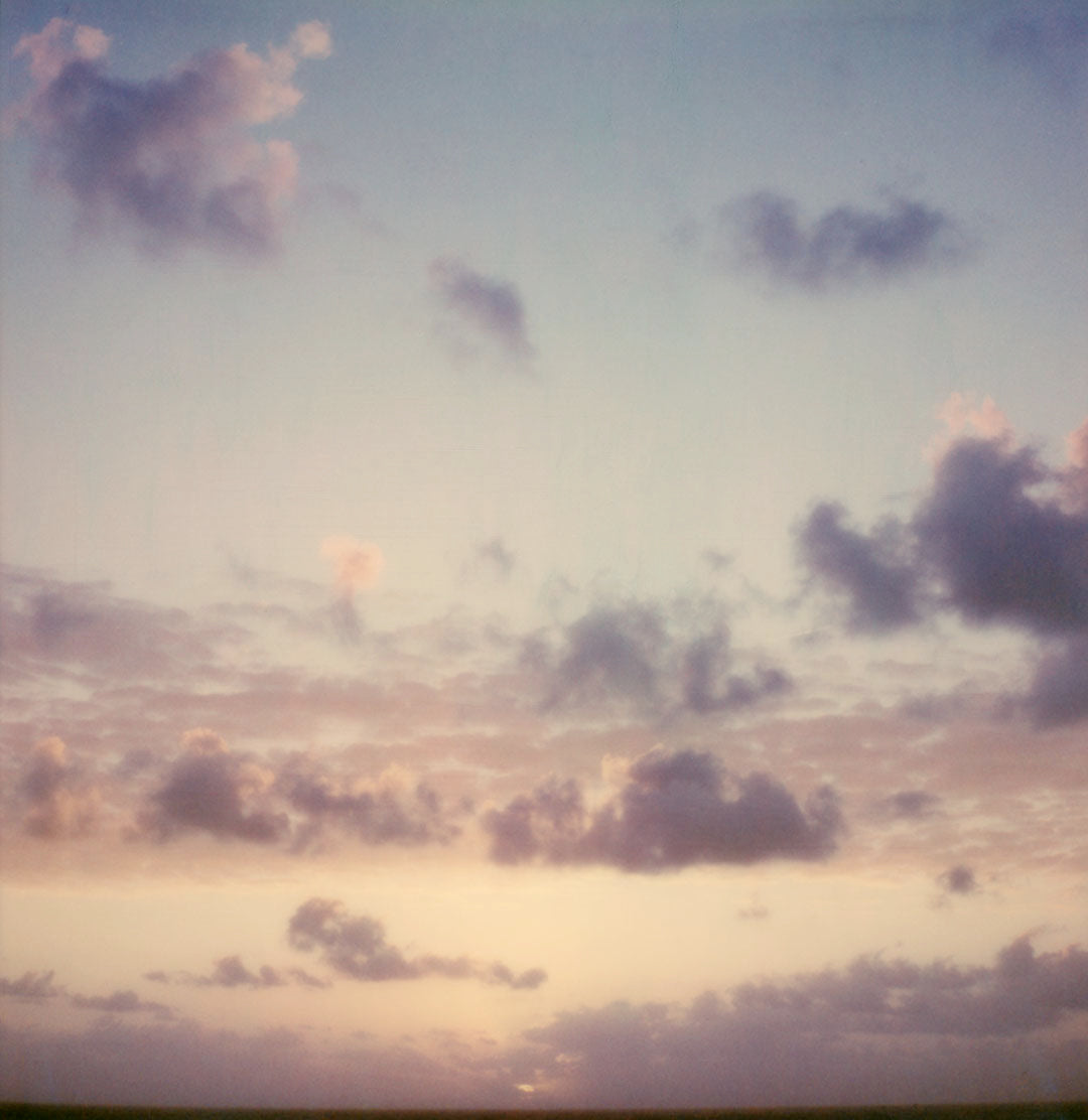Polaroid lever de soleil nuages