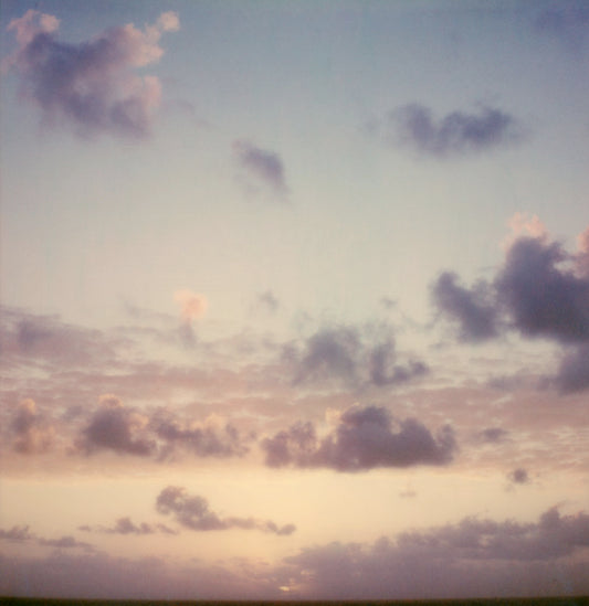 Polaroid lever de soleil nuages